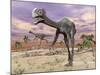 Two Gigantoraptor Dinosaurs Walking in the Desert-null-Mounted Art Print