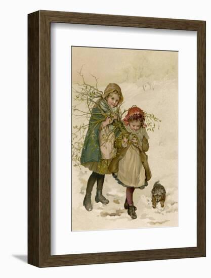 Two Girls and Their Dog Gather Mistletoe in the Snow-Lizzie-Framed Photographic Print