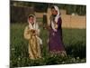 Two Girls Play in the Bamiyan Valley, Next to the Buddha Statue That was Destroyed, July 19, 2006-Rodrigo Abd-Mounted Photographic Print