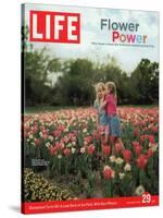 Two Girls Sharing a Secret Standing in Tulip Beds at a Dallas Flower Show, April 29, 2005-Greg Miller-Stretched Canvas