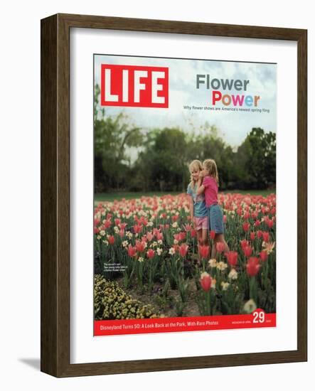Two Girls Sharing a Secret Standing in Tulip Beds at a Dallas Flower Show, April 29, 2005-Greg Miller-Framed Photographic Print