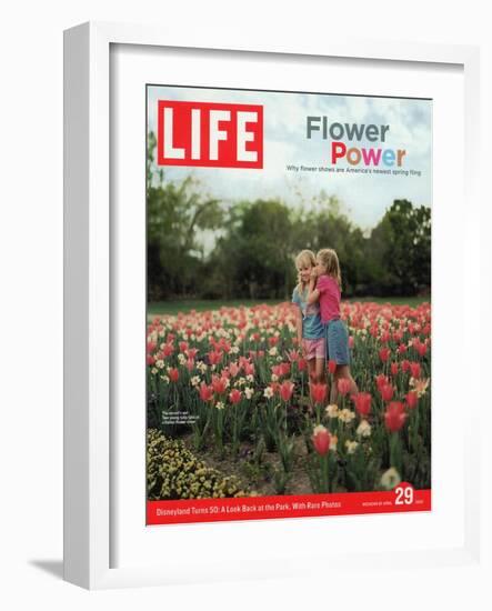 Two Girls Sharing a Secret Standing in Tulip Beds at a Dallas Flower Show, April 29, 2005-Greg Miller-Framed Photographic Print