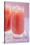Two Glasses of Pink Grapefruit Juice with Ice Cubes-Foodcollection-Stretched Canvas