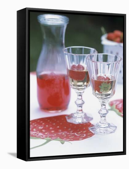 Two Glasses of Strawberry Wine on a Table in the Garden-Alena Hrbkova-Framed Stretched Canvas