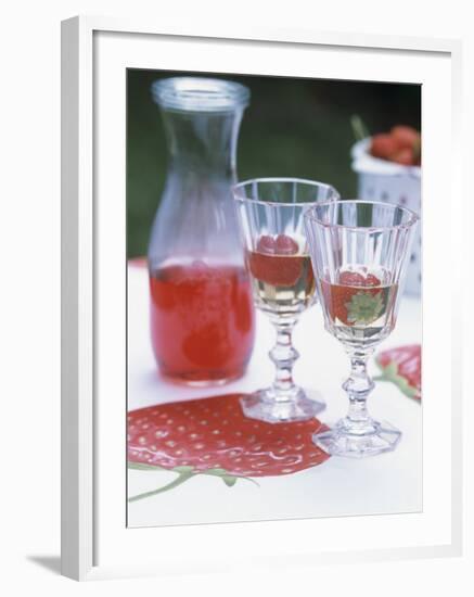 Two Glasses of Strawberry Wine on a Table in the Garden-Alena Hrbkova-Framed Photographic Print