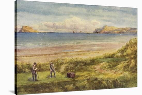 Two Golfers Tee Off at Portmarnock, One of Ireland's Finest Links Courses-null-Stretched Canvas