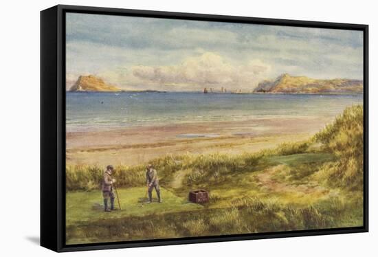 Two Golfers Tee Off at Portmarnock, One of Ireland's Finest Links Courses-null-Framed Stretched Canvas