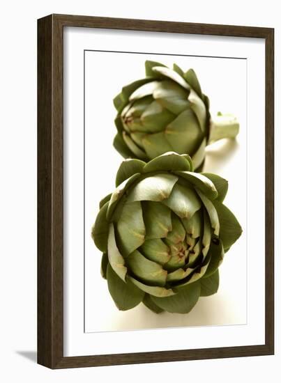 Two Green Artichokes-Alain Caste-Framed Photographic Print