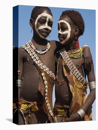 Two Hamer Girls Wearing Traditional Goat Skin Dress Decorated with Cowie Shells, Turmi, Ethiopia-Jane Sweeney-Stretched Canvas