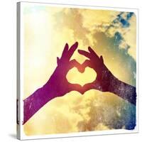 Two Hands Making a Heart Shape in the Sky-graphicphoto-Stretched Canvas