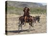 Two Happy Himba Girls Ride a Donkey to Market, Namibia-Nigel Pavitt-Stretched Canvas