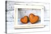 Two Hearts Made of Stone in Picture Frame-Uwe Merkel-Stretched Canvas