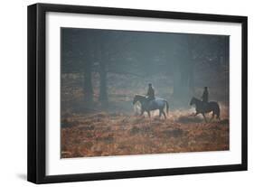 Two Horseback Riders Make their Way Through Misty Richmond Park in Winter-Alex Saberi-Framed Photographic Print