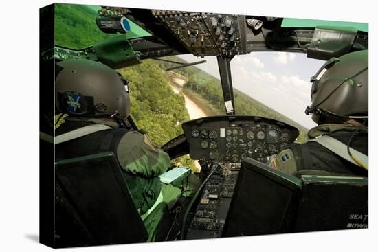 Two Instructor Pilots Practice Low Flying Operations in a Uh-1H Huey Helicopter-null-Stretched Canvas