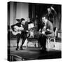 Two Jazz Guitar Players Performing on Stage-null-Stretched Canvas