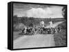 Two Kennel Workers Exercising Foxhounds on an English Country Lane-null-Framed Stretched Canvas