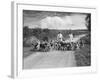 Two Kennel Workers Exercising Foxhounds on an English Country Lane-null-Framed Photographic Print