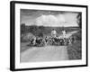 Two Kennel Workers Exercising Foxhounds on an English Country Lane-null-Framed Photographic Print