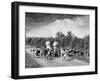 Two Kennel Workers Exercising Foxhounds on an English Country Lane-null-Framed Photographic Print