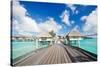 Two Kids Walking towards over the Water Bungalowas-BlueOrange Studio-Stretched Canvas