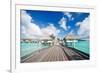 Two Kids Walking towards over the Water Bungalowas-BlueOrange Studio-Framed Photographic Print