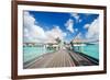 Two Kids Walking towards over the Water Bungalowas-BlueOrange Studio-Framed Photographic Print