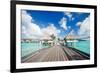 Two Kids Walking towards over the Water Bungalowas-BlueOrange Studio-Framed Photographic Print