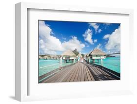 Two Kids Walking towards over the Water Bungalowas-BlueOrange Studio-Framed Photographic Print