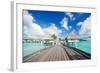 Two Kids Walking towards over the Water Bungalowas-BlueOrange Studio-Framed Photographic Print