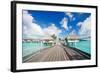 Two Kids Walking towards over the Water Bungalowas-BlueOrange Studio-Framed Photographic Print