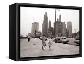 Two Ladies Walking the Sidewalk Skyscrapers in Chicago America's Windy City, in the 1960s-null-Framed Stretched Canvas