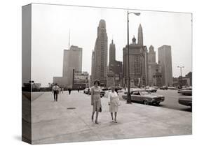 Two Ladies Walking the Sidewalk Skyscrapers in Chicago America's Windy City, in the 1960s-null-Stretched Canvas