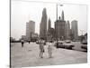 Two Ladies Walking the Sidewalk Skyscrapers in Chicago America's Windy City, in the 1960s-null-Stretched Canvas