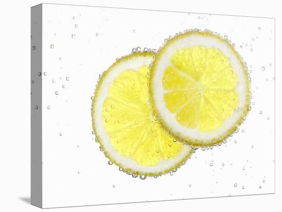 Two Lemon Slices in Water with Air Bubbles-Kröger & Gross-Stretched Canvas