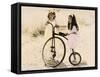 Two Little Girls by an Old Fashioned Bicycle-Nora Hernandez-Framed Stretched Canvas