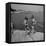 Two Little Girls Modelling Sun Dot Bathing Suits While Playing on the Rocks-Nina Leen-Framed Stretched Canvas