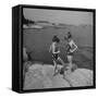 Two Little Girls Modelling Sun Dot Bathing Suits While Playing on the Rocks-Nina Leen-Framed Stretched Canvas