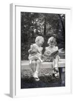 Two Little Girls Sitting on a Bench-Philip Gendreau-Framed Photographic Print