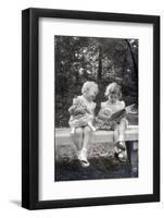 Two Little Girls Sitting on a Bench-Philip Gendreau-Framed Photographic Print