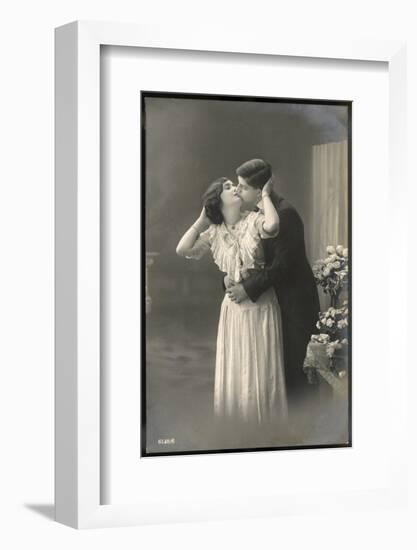 Two Lovers Embrace and Kiss-null-Framed Photographic Print