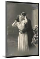 Two Lovers Embrace and Kiss-null-Mounted Photographic Print