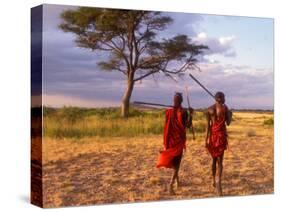 Two Maasai Morans Walking with Spears at Sunset, Amboseli National Park, Kenya-Alison Jones-Stretched Canvas