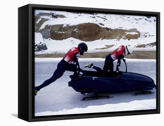 Two Man Bobsled Team Pushing Off at the Start , Lake Placid, New York, USA-Paul Sutton-Framed Stretched Canvas