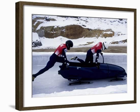 Two Man Bobsled Team Pushing Off at the Start , Lake Placid, New York, USA-Paul Sutton-Framed Photographic Print