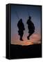 Two Masaai Warriors Silhouetted Performing Traditional Jump - Leap Kopje at Sunset-Nick Garbutt-Framed Stretched Canvas