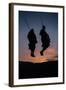 Two Masaai Warriors Silhouetted Performing Traditional Jump - Leap Kopje at Sunset-Nick Garbutt-Framed Photographic Print