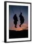 Two Masaai Warriors Silhouetted Performing Traditional Jump - Leap Kopje at Sunset-Nick Garbutt-Framed Photographic Print