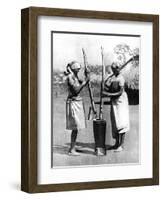 Two Mashona Tribeswomen Pounding Maize and Millet, Zimbabwe, Africa, 1936-null-Framed Giclee Print