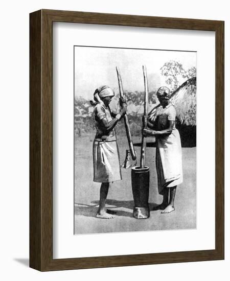 Two Mashona Tribeswomen Pounding Maize and Millet, Zimbabwe, Africa, 1936-null-Framed Giclee Print