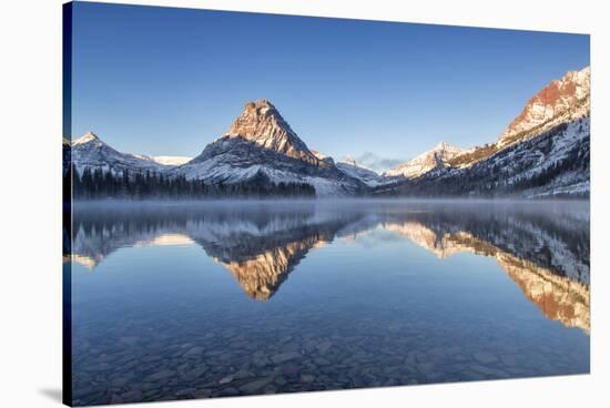 Two Medicine Lake in Winter, Glacier National Park, Montana, USA-Chuck Haney-Stretched Canvas